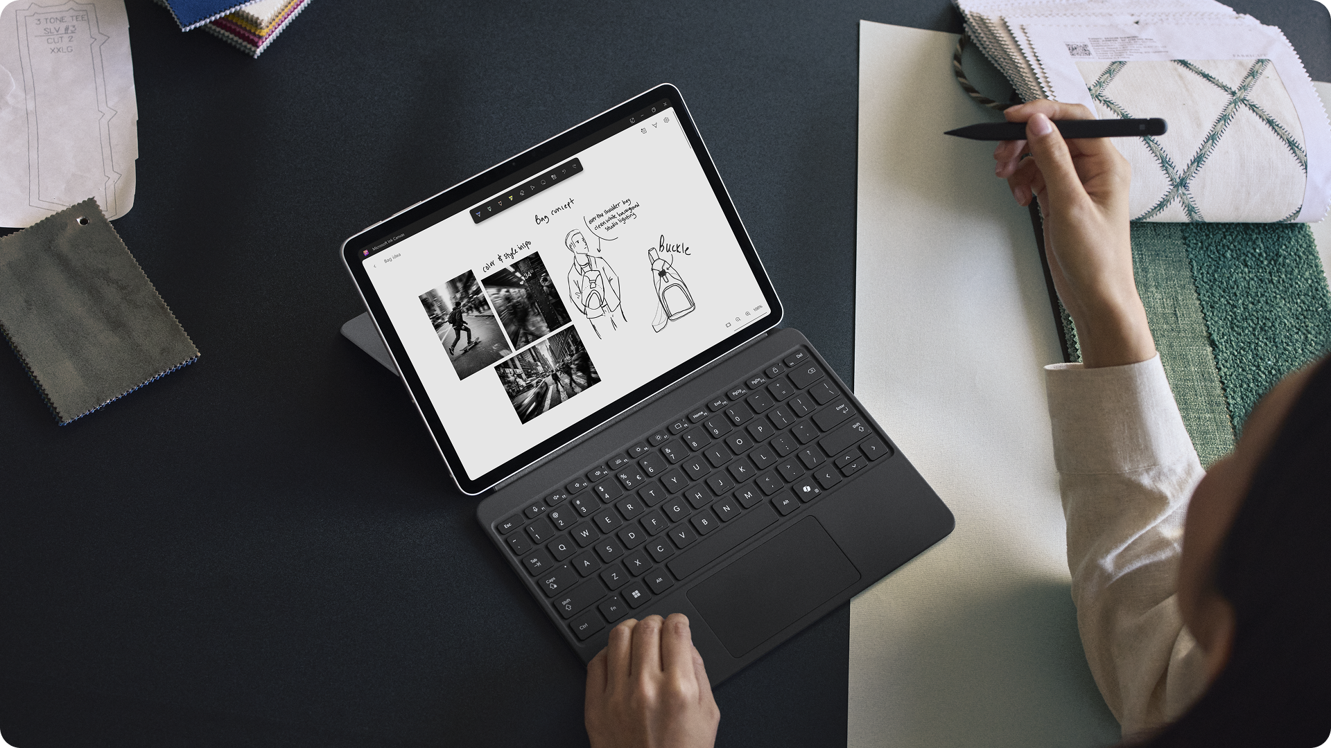 用户搭配超薄触控笔与 Surface Pro 12 英寸键盘使用 Surface Pro 商用版。